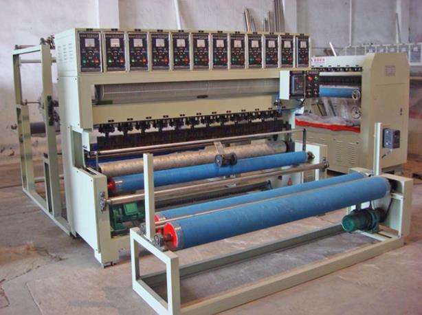 bed cover embossing machine .jpg